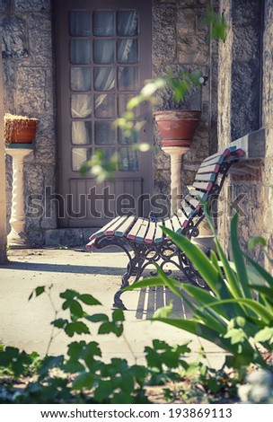 bench in abandoned spring home garden