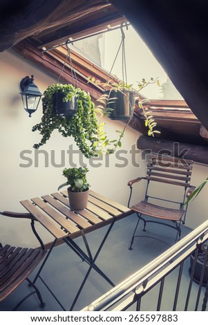 home patio with wooden furniture