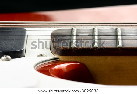 Close up at twenty second fret of an electric guitar