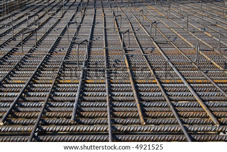 Lot of steel bars of a heavy reinforcement lying in perfect order