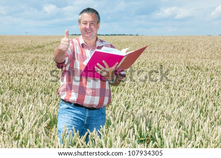 Agricultural engineer at the field inspection