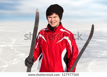 Woman with cross-country skis