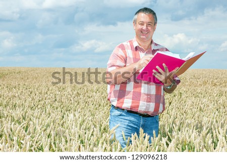 Agricultural engineer at the field inspection