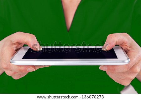 Hands and fingers on the tablet PC