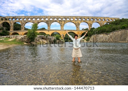 Woman in front of the Roman Gard Pont du Gard