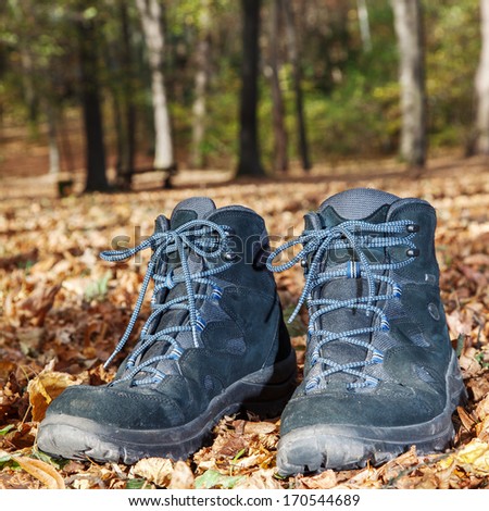 Hiking boots in autumn foliage