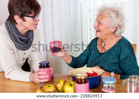 Two women talk about the homemade jam