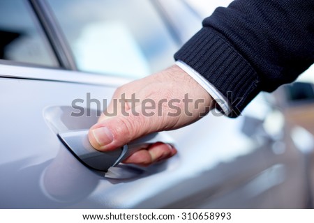 Hands On Car Door
