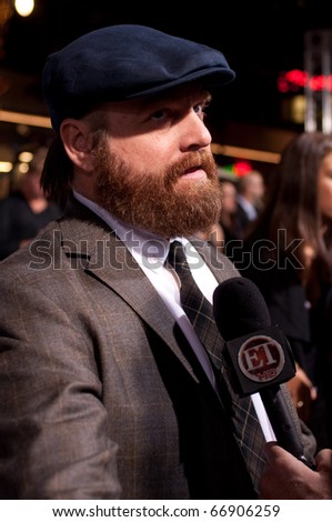 HOLLYWOOD, CA - NOVEMBER 28: Actor Zach Galifianakis arrives to the premiere of the movie \