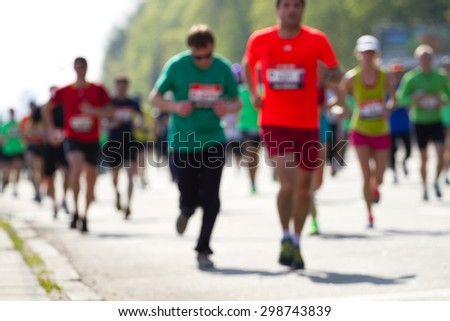 Blurred mass of marathon runners