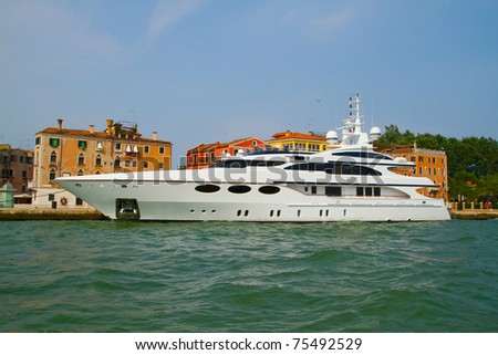 Yacht docked at Venice , Italy .
