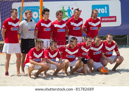 KIEV, UKRAINE - JUNE 18:Unknown players of the team of  Hydropark , playing the Ukrainian Championship of Beach Soccer. Pose for a group photo before the match on June 18, 2011 in Kyiv, Ukraine .