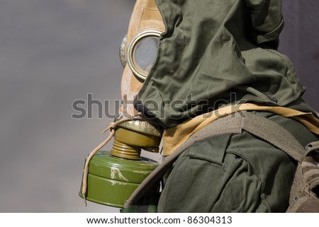 Portrait of man in gas mask