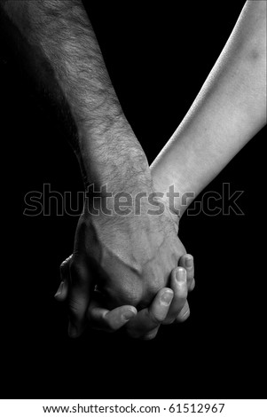 stock photo : Black and white photo of two people holding hands