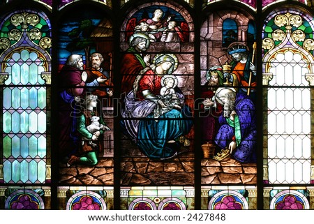 Stained Glass Church Window - Epiphany scene on a church central window.