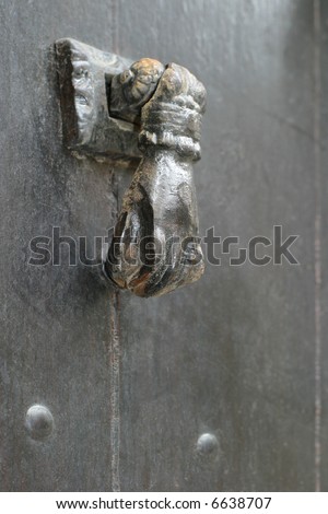 Door Knocker - close-up on a french antique door-knocker.
