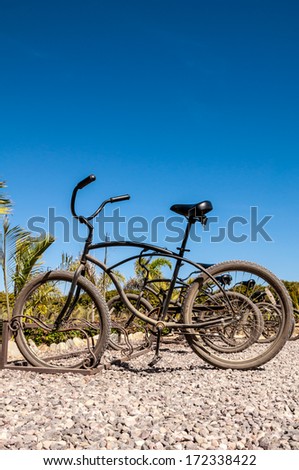 Bikes lined up at a rack in Mexico