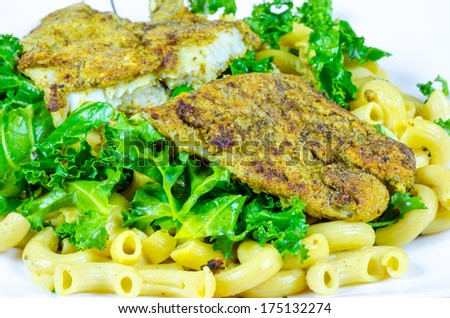 Fish on top on kale & gluten free pasta