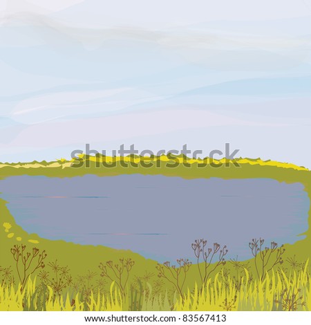 Autumnal landscape with lake, meadow, dry grass,cloudy sky