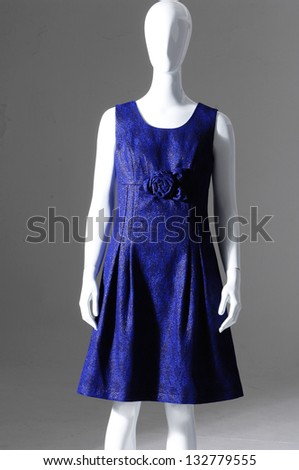 female fashion blue clothes on a mannequin-white background