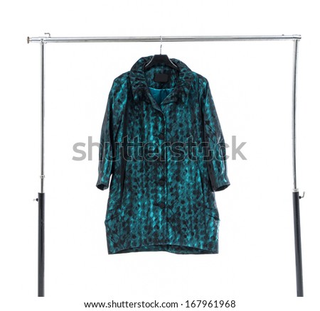female green coat clothes on a hanger