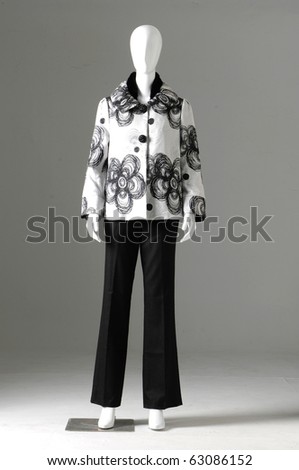 gray background -fashion female cloth on a dummy