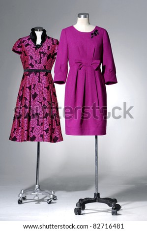 Females red dress on two mannequin isolated
