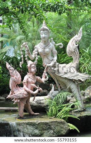 The sculpture of two bird lady in the garden. It is for decoration