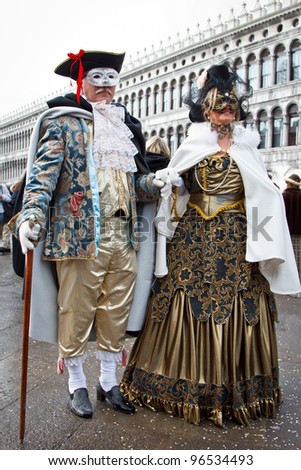 VENICE, ITALY - FEBRUARY 12: Couple in costume, mask, during the traditional Venice carnival on february 12, 2012 in Venice,  Italy.
