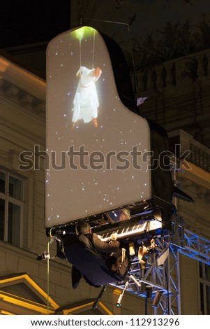 BUCHAREST, ROMANIA - SEPTEMBER 13: David Moreno performs his Floten Tecles show during B-FIT in the Street International Street Theater Festival on September 13, 2012 in Bucharest, Romania.