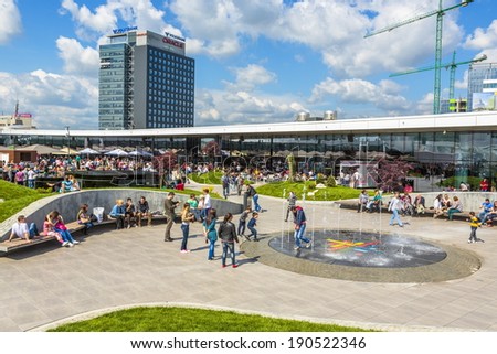 BUCHAREST, ROMANIA - MAY 1: Unidentified people enjoy at recreation area in Promenada Mall on May 1, 2014 in Bucharest, Romania. The mall received Building of the Year SEE 2014 at CEEQA Gala, Warsaw.