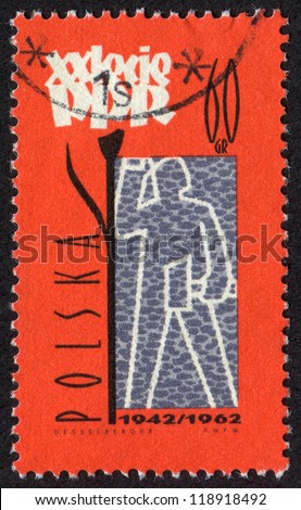 POLAND - CIRCA 1962: stamp printed in Poland shows Worker with hammer. Polish Workers Party, 20th anniversary. Scott catalog 1043 A376 60g, red, circa 1962