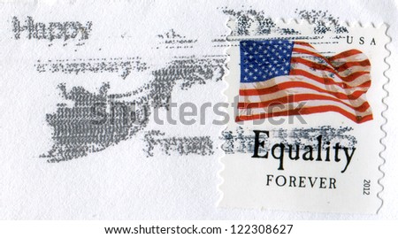 USA- CIRCA 2012: Postage stamp printed in USA shows the image of the USA Flag. Equality. USA forever with Happy Holidays mark, circa 2012