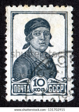 RUSSIA - CIRCA 1938: Postage stamp printed in the USSR (Soviet Union) shows a Factory Worker. Scott Catalog 616 A109 10k, circa 1938