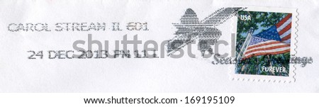 USA- CIRCA 2013: Postage stamp printed in USA shows the image of the USA Flag. USA forever, circa 2013