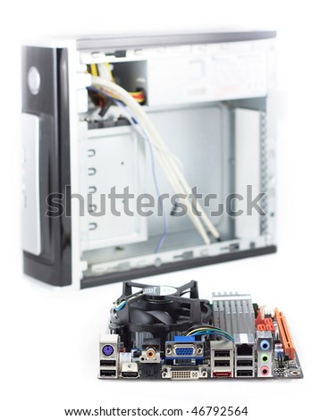 stock-photo-assembled-computer-system-and-opened-computer-case-46792564.jpg