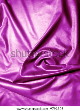 close up photo of a purple satin sheet
