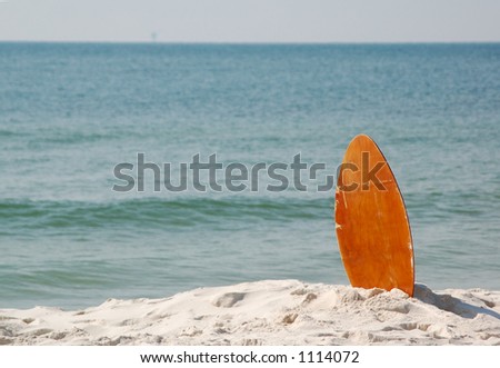 boogie board on the beach