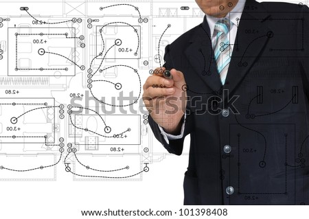 Hand of Business Man Draw architect or home with electrical plan