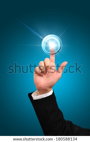 Hand of Business man pushing start button or play button