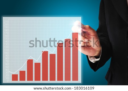 Business Man draw graph on virtual display for use as illustration or any.