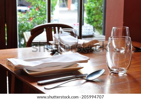 Table arrangement in an expensive cuisine restaurant
