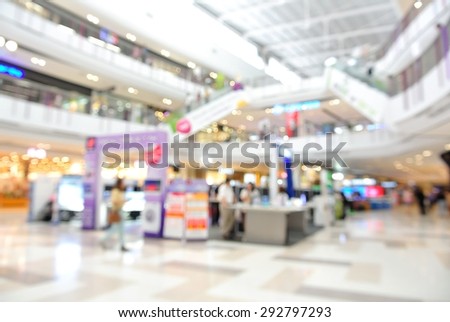 Blurred background with Bokeh of people shopping at mall in the big sale event.