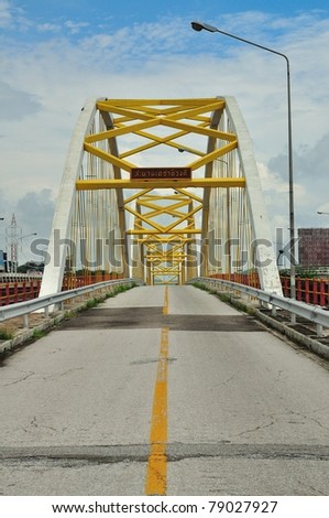 Yellow bridge in Nakornsawan, Thailand.  It is called \