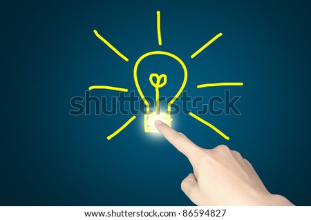 Male hand touch or draw light bulb on touch screen