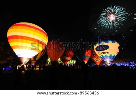 CHIANG MAI, THAILAND  - NOVEMBER 25: Unidentified hot air balloons glowing in opening ceremony of Thailand International Balloon Festival 2011 at Prince royal college in Chiangmai, Thailand on November 25, 2011.