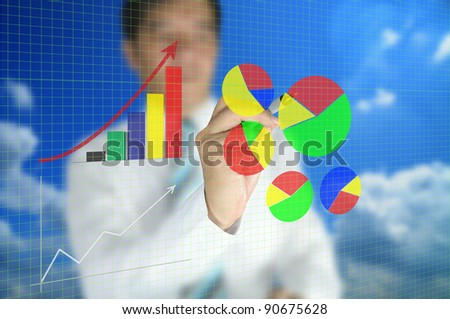 Business man write graph on transparent  touch screen