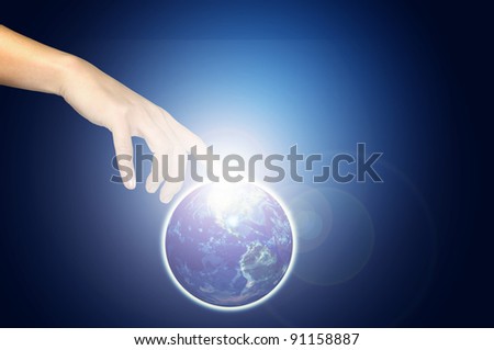 hand touch earth globe as environment concept