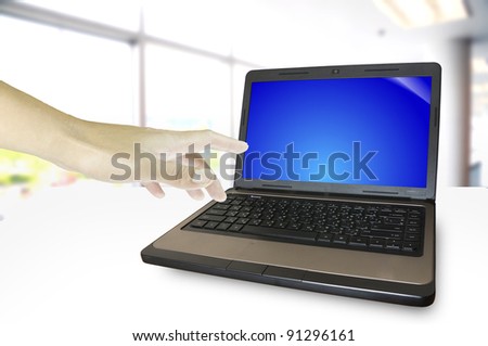 male hand push on notebook computer on white background