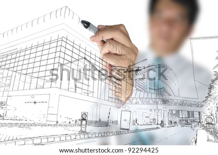 Business man draw building and cityscape